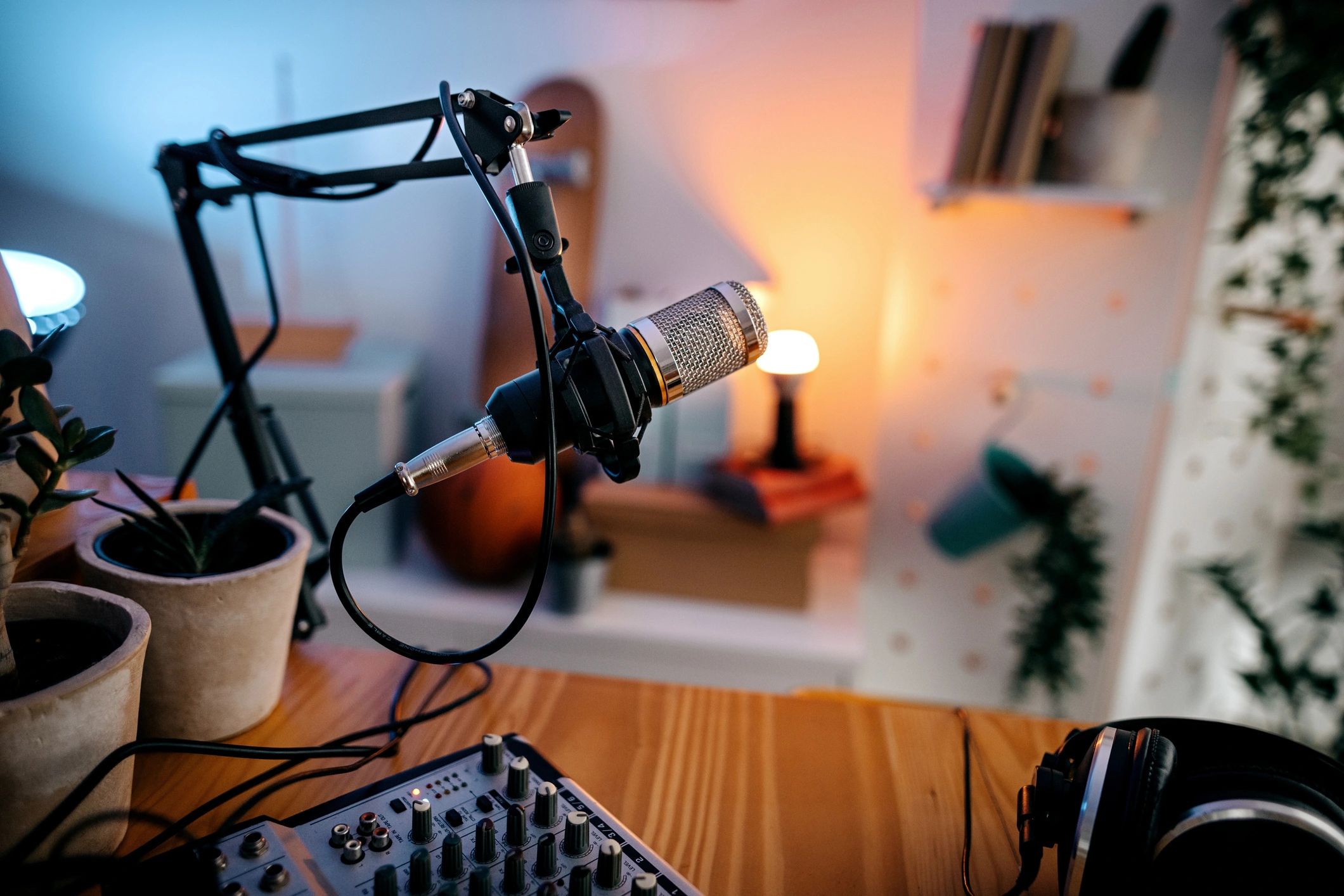 Podcast microphone and recording setup on a studio desk