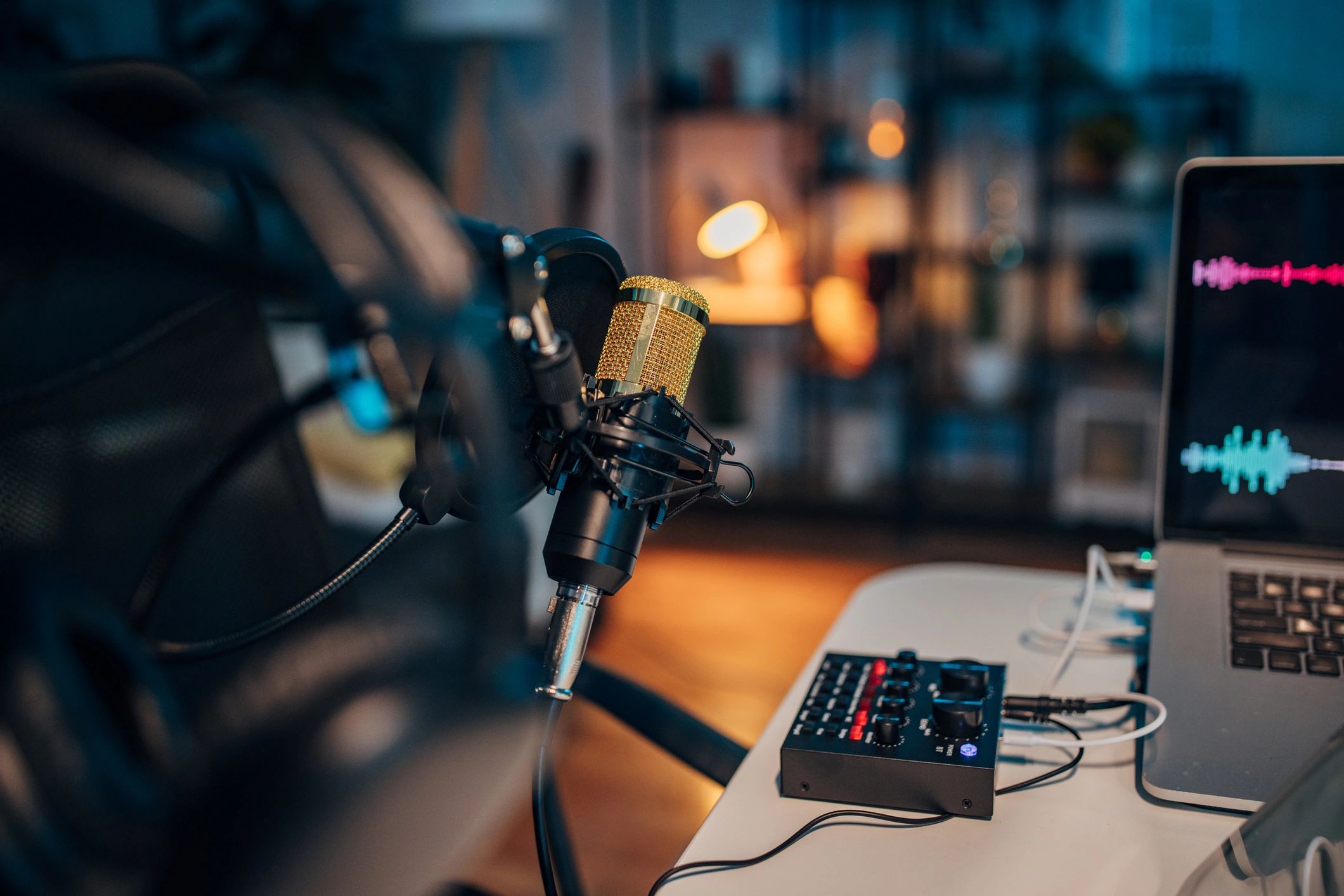 Empty podcast studio with microphones and lighting
