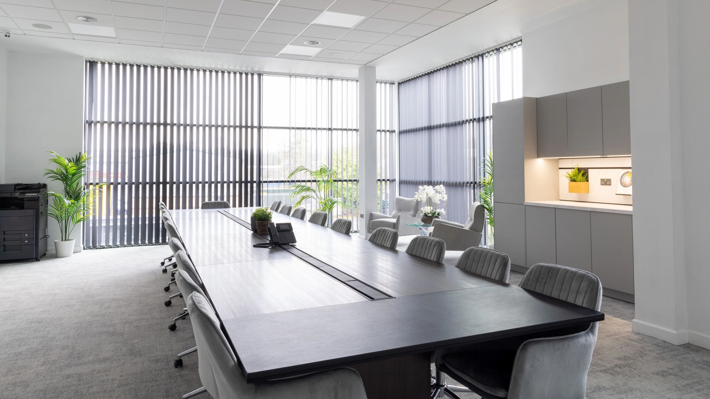 Modern conference room with meeting table and chairs